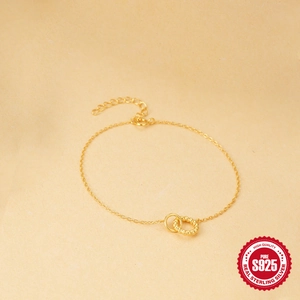 Minimalist S925 sterling silver gold-plated bracelet with twisted interlocked circles