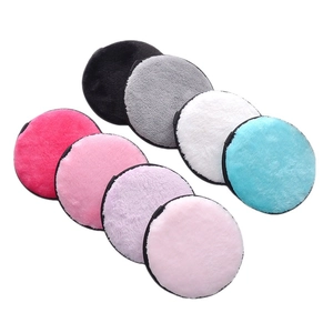 Set of 8 colorful microfiber reusable makeup remover pads in a clean white background