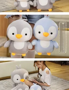 Detail of plush penguin toy showing soft fabric texture and cute 3D orange beak details