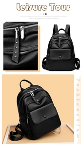 Close-up of litchi texture leather, silver zippers, and rivet details on black backpack