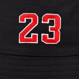 Close-up of the detailed red and white 23 embroidery on this black cotton bucket hat