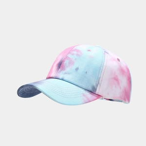 Detail of pink and blue tie-dye baseball cap with six-panel structure and curved brim