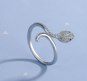 Detailed view of S925 hallmark on a silver snake-shaped ring with crystal accents