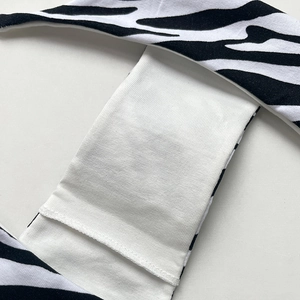 Zebra print double-layer low-rise thong featuring premium cotton lining and soft straps