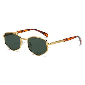Retro golden hexagonal metal frame sunglasses with dark green lenses and tortoiseshell tips