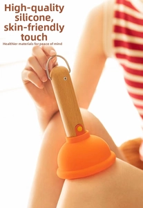 Silicone toilet plunger night light with wood handle shown on leg for size reference