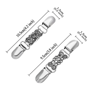 Detailed macro view showing dimensions of vintage floral engraved cardigan clips in metal