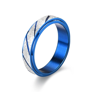 Detail of silver frosted band with diagonal grooves and blue plated steel interior