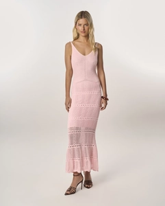 Detailed knit pattern of a pink pointelle maxi beach dress with thin straps