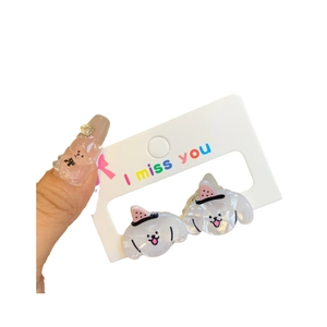 Cute white acrylic puppy hair clips with pink hats on card display for girls