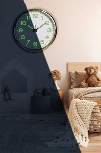 Detailed split view showing 12-inch luminous wall clock in daylight and nighttime mode