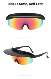 Detail view of black visor sunglasses with red-orange gradient lenses for sports
