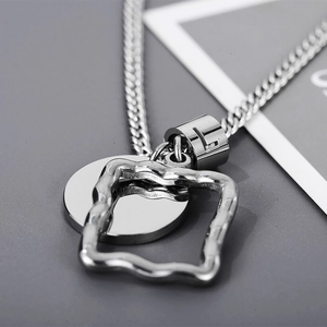 Minimalist silver titanium steel necklace with square frame and round disc pendants