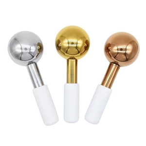 Three mermaid cooling globes in gold, silver and rose gold for facial massage therapy