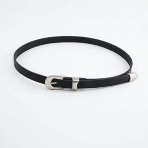 Vintage black leather belt for women featuring a minimalist horseshoe silver metal buckle