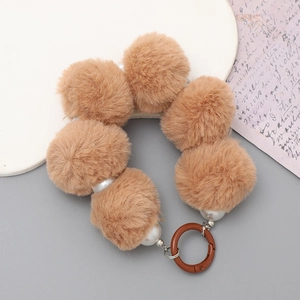 Chic brown plush ball phone charm with white beads and metal spring ring wristlet