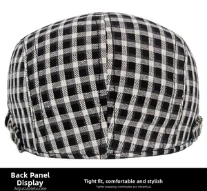 Detail view of the back of a black and white checkered ivy cap with side metal buckles