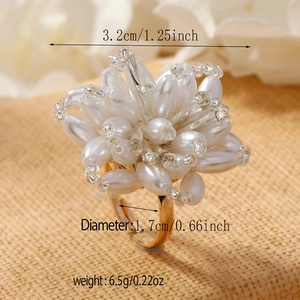 Detailed view of woven floral ring showing 1.7cm diameter and 3.2cm flower width