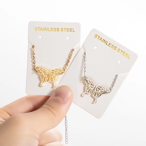 Golden and silver hollow butterfly pendants on stainless steel chains for women