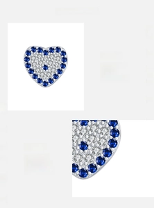 Detail of S925 sterling silver heart earrings with 5A blue and white zircon pavé setting