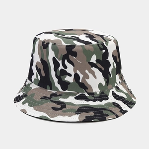 Detailed view of camouflage bucket hat with reinforced stitching and durable canvas texture