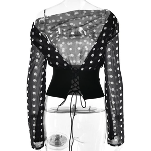Close-up of sexy backless polka dot chiffon top with adjustable waist tie