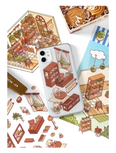Detailed view of bakery-themed iPhone case featuring cute animals in warm brown tones