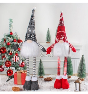 Luminous Christmas gnomes with retractable legs in a cozy festive scene with a decorated tree