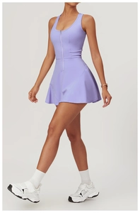 Detail of lilac athletic dress featuring a zipper neckline and elegant A-line hem silhouette