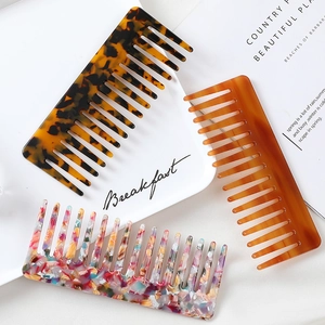 Fashionable marble pattern acetate hair combs in tortoise and amber shell finishes