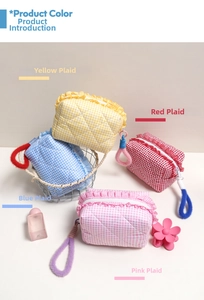 Detailed set of four quilted lattice cosmetic bags with ruffle edges and plush loop handles