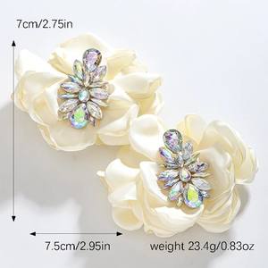 Detailed size view of cream fabric camellia earrings with AB crystals and metal base