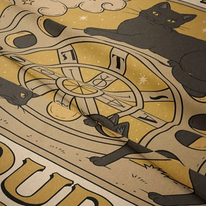Close-up of feline tarot tapestry showing soft velvet texture and black cat wheel design