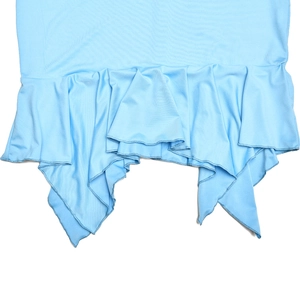 Detailed close-up of light blue ruffled hem and irregular edge design of the dress