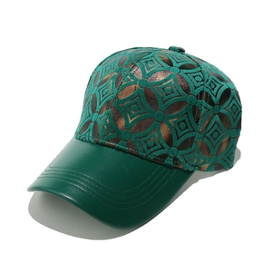 Vintage geometric pattern baseball cap with dark green faux leather brim and metallic finish