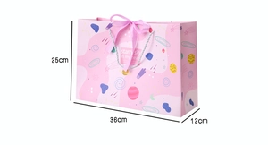 Pink gift bag with starry sky pattern and satin bow detailing, size 36x25x12cm
