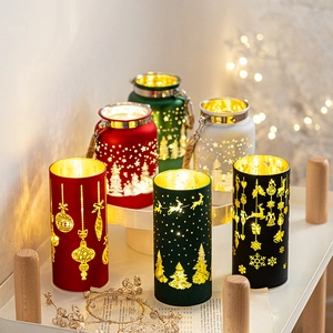 Christmas glass candle holder with hollow reindeer and snowflake patterns and LED lights