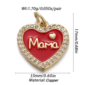 Detail view of heart-shaped Mama pendant with red enamel and copper gold finish