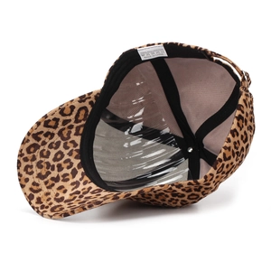Detail view of the leopard print baseball cap interior showing 100% polyester fabric