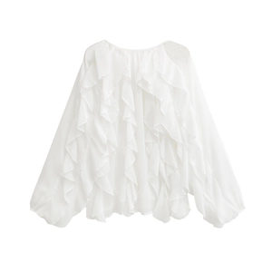 Detail of layered ruffles and soft chiffon fabric on a white long sleeve shirt for women