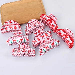 Christmas themed acetate shark hair clips set featuring red and white festive snowflake patterns