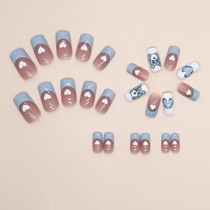 Blue heart and puppy patterned press-on nails in medium length french square style