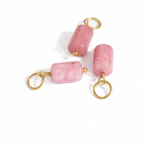 Three-piece set of natural pink stone cylinder pendants with gold wire wrapping
