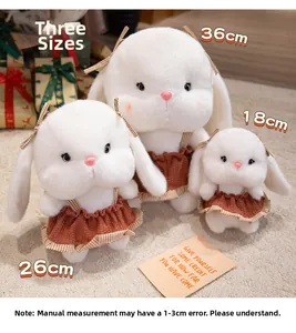Three plush white rabbits in plaid dresses shown in 18cm, 26cm, and 36cm sizes