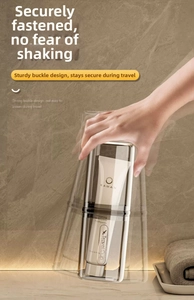 Detail of secure buckle closure on a portable gray travel toothbrush cup for travel