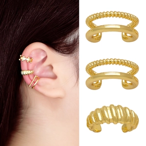 Three-piece set of vintage gold ear cuffs with twisted and ribbed textures for women