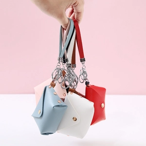 Mini PU leather keychain wallets in multiple colors with metal snaps and wrist straps