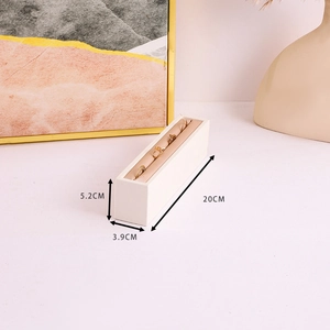 Detailed cream jewelry tray showing dimensions 20x3.9x5.2cm for rings and earrings