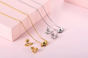 Detailed view of gold and silver evil eye jewelry sets with necklaces and earrings
