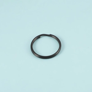 Detail view of a black stainless steel double-loop key ring for DIY hardware accessories